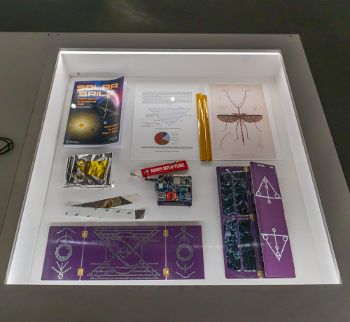 TX-2:MOONSHADOW SOLAR SAIL vitrine as part of : REWILD at MAXXI; photo credit: Adriana Knouf